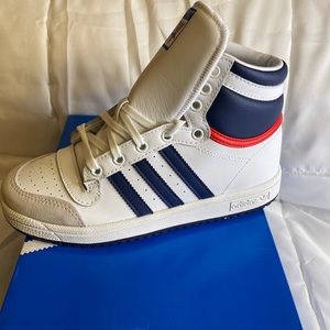 Boys Adidas’s white high top w/ blue stripes and blue and red accents on back